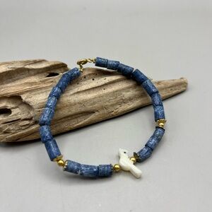 Blue Sodalite and Gold Beaded Bracelet with White Carved Bird Accent -handmade